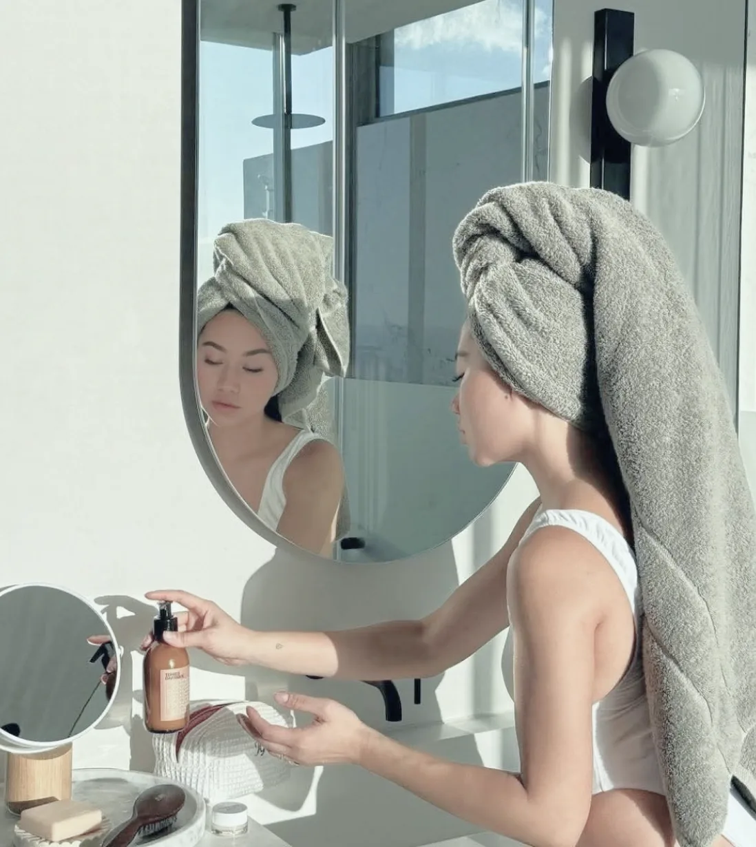 Client checking hair in the mirror